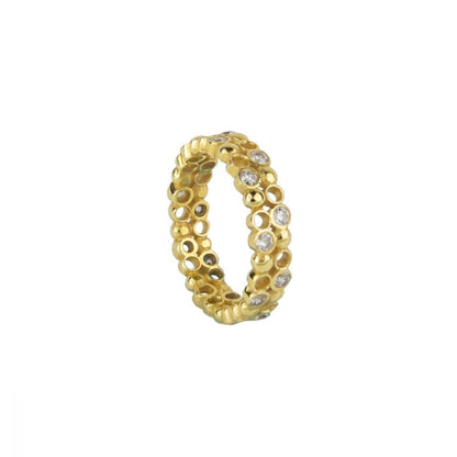 The Statement Honeycomb Ring is crafted in 24k Gold-plated sterling silver and is consisting of two rows of tiny circles, some of them embellished with sparkly Cubic Zirconia. We love them because they allow you to create your own personal expression and they are easy to style with other jewellery. Also, available with green, multicolour and red ZC. Contact us to pre-order. Estimated delivery time: 15 business days. Plating: 24k GoldStone: Cubic ZirconiaMaterial: 925 Sterling Silver Designed and made in Gre