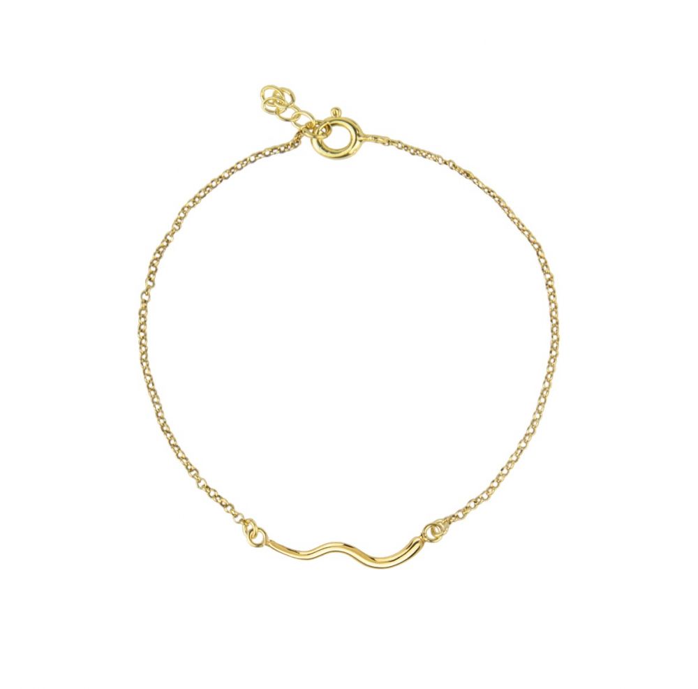 The handcrafted Wavy Bracelet features a beautifully fluid design.   Material: 9k Gold    Designed and made in Greece.